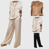 Amaya – Spring set with a light blouse and wide pants